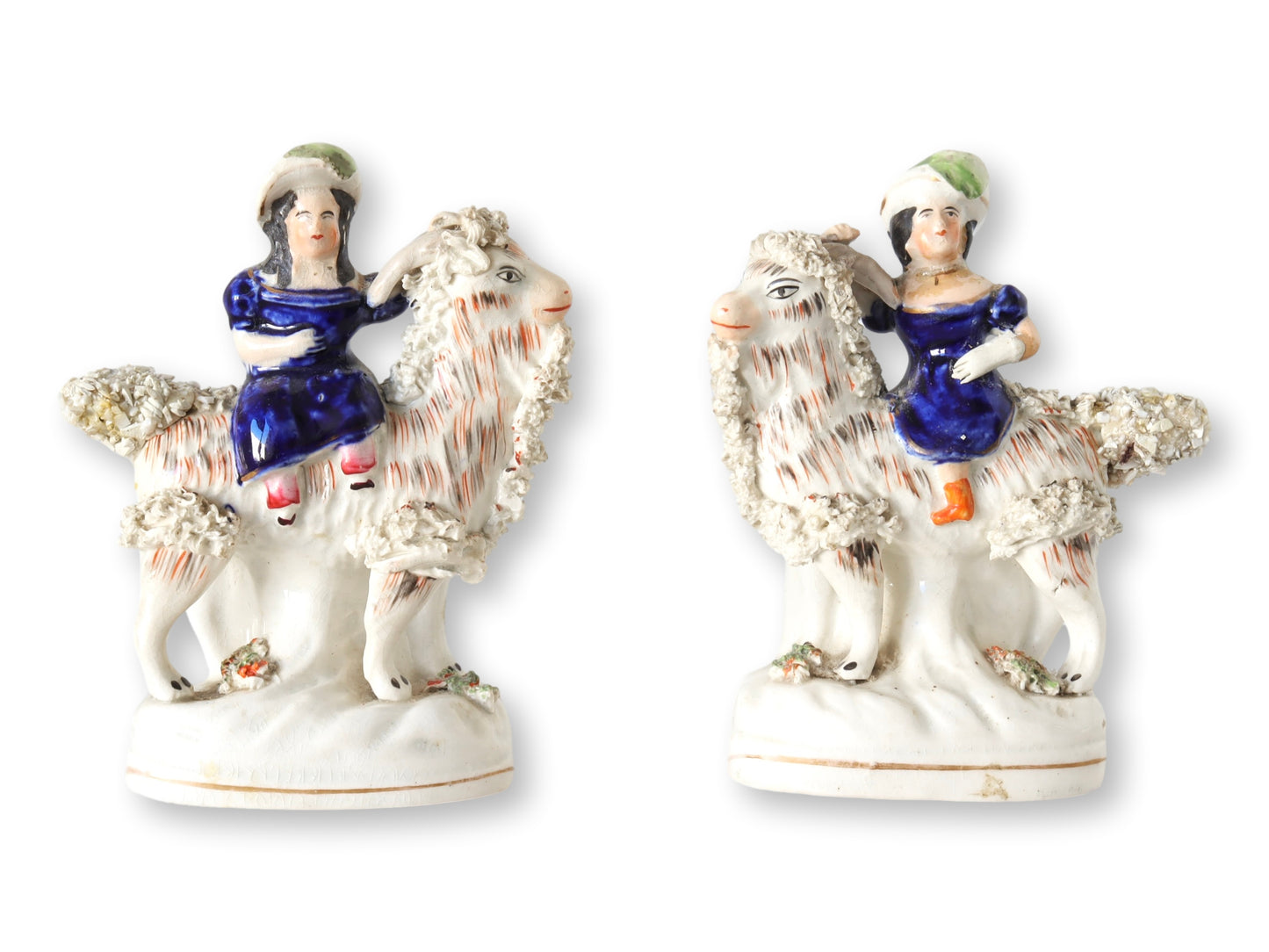 Antique Staffordshire Children on Goats