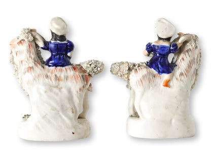 Antique Staffordshire Children on Goats